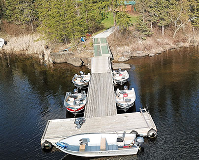Fishing Boats and Dock Overlooking Rowdy Lake 